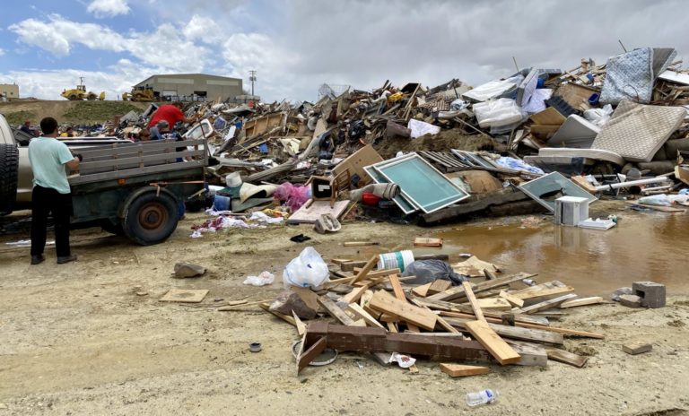 Rawlins landfill crew crushing tons of waste after Free Dump Days